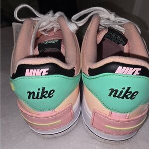 Nike Kids Sneakers in Pink, Mint, and Peach